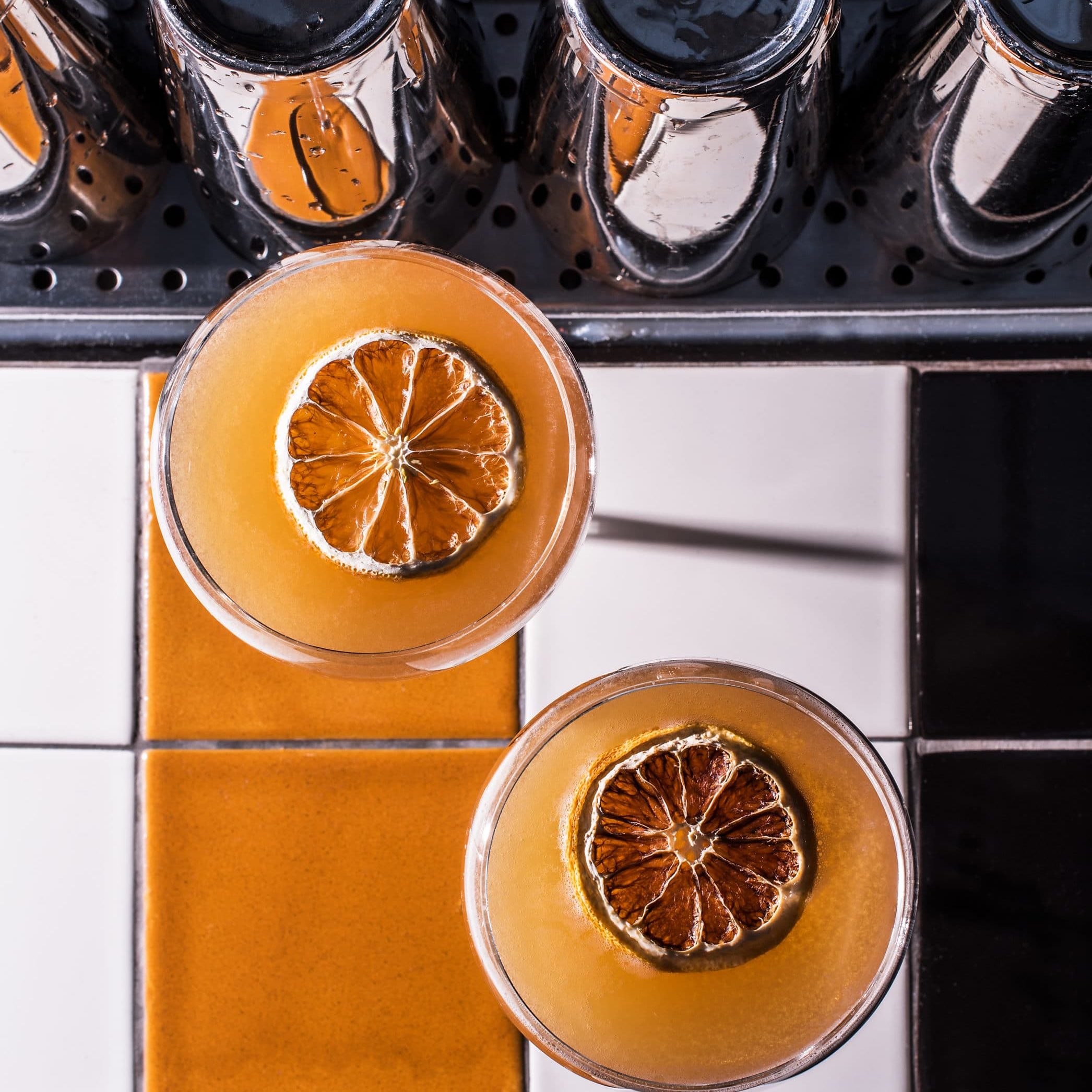 citrus cocktails at a bar